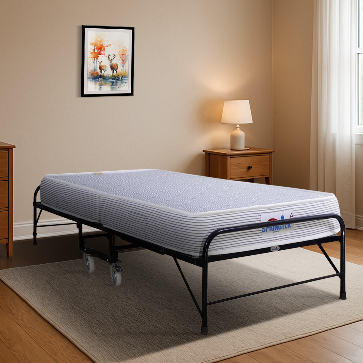 Folding Rollaway Bed With 6″ Mattress sturdy portable rollaway bed on a metal frame in a room with a lamp and painting.
