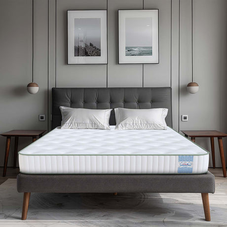 Supernova Latex  Memory foam Mattress dual comfort mattress design on a gray bed frame in a bedroom setting with decor elements.