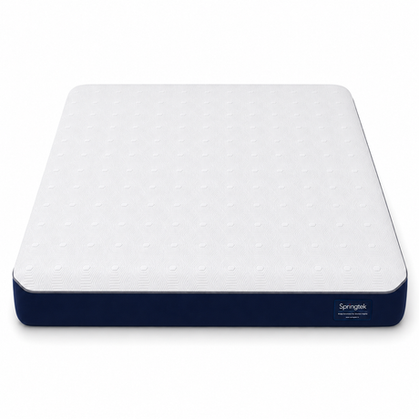 A Wavemax Spine Support Orthopedic Mattress shown from a high angle on a clean white background. The mattress features a white quilted top surface with a subtle dotted pattern and a dark navy blue side border with the 'Springfree' brand label visible in the bottom right corner.